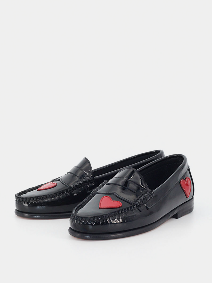 Black patent leather loafers with hearts decoration